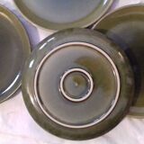 Suite of four green varnished plates