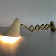 Cream metal and brass wall lamp with scissors design by Karl Lang for SIS Licht, 1950s, Germany.