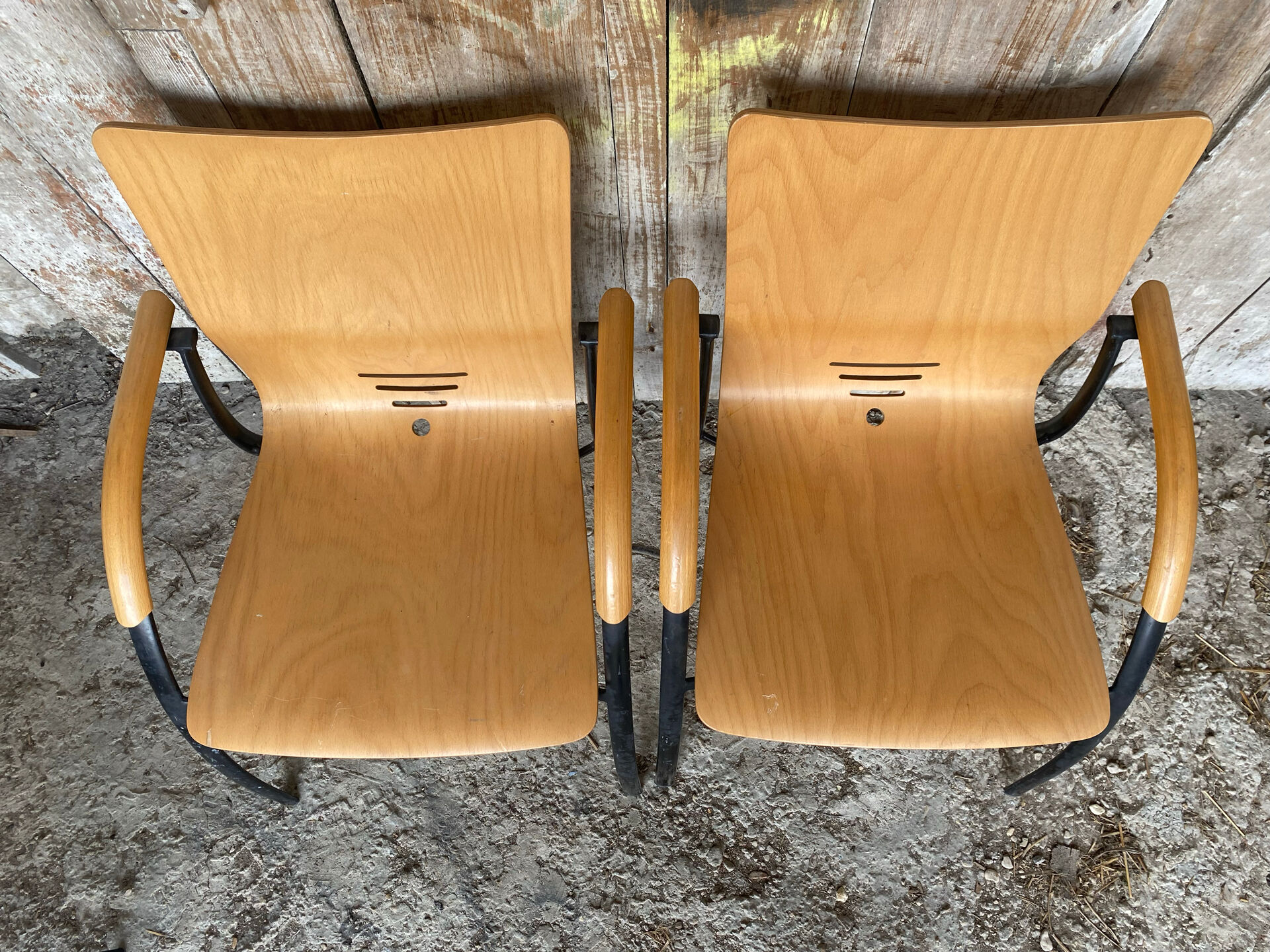 Pair of Vintage RONÉO Armchairs with Black Metal Legs + Curved Wooden Shell