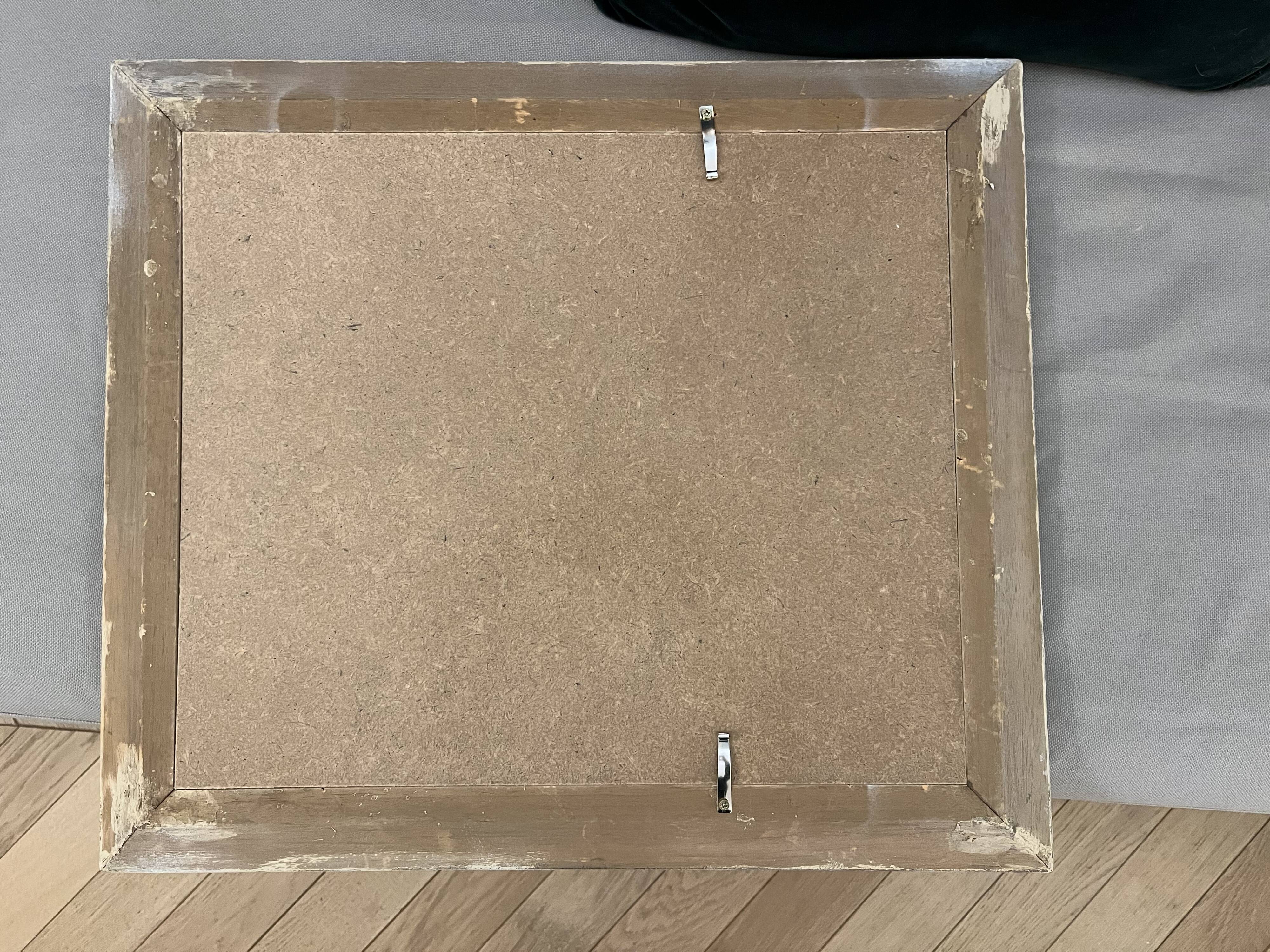 Almond branches in bloom in a glass of water