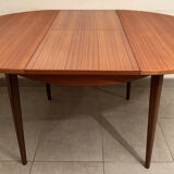 Scandinavian round teak dining table from the 60s extendable