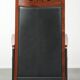 Electrically adjustable Art Deco design recliner with black cowhide leather