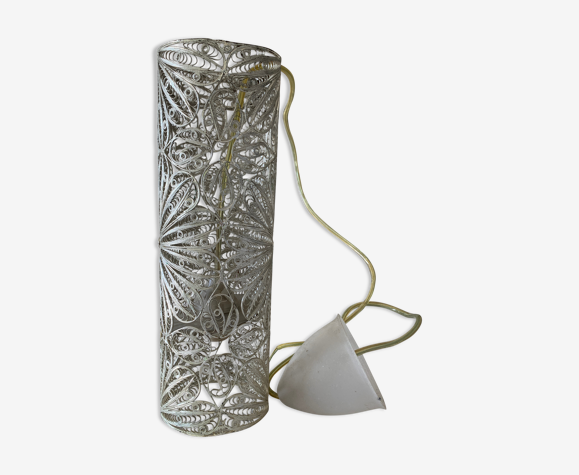 Sculpted metal suspension