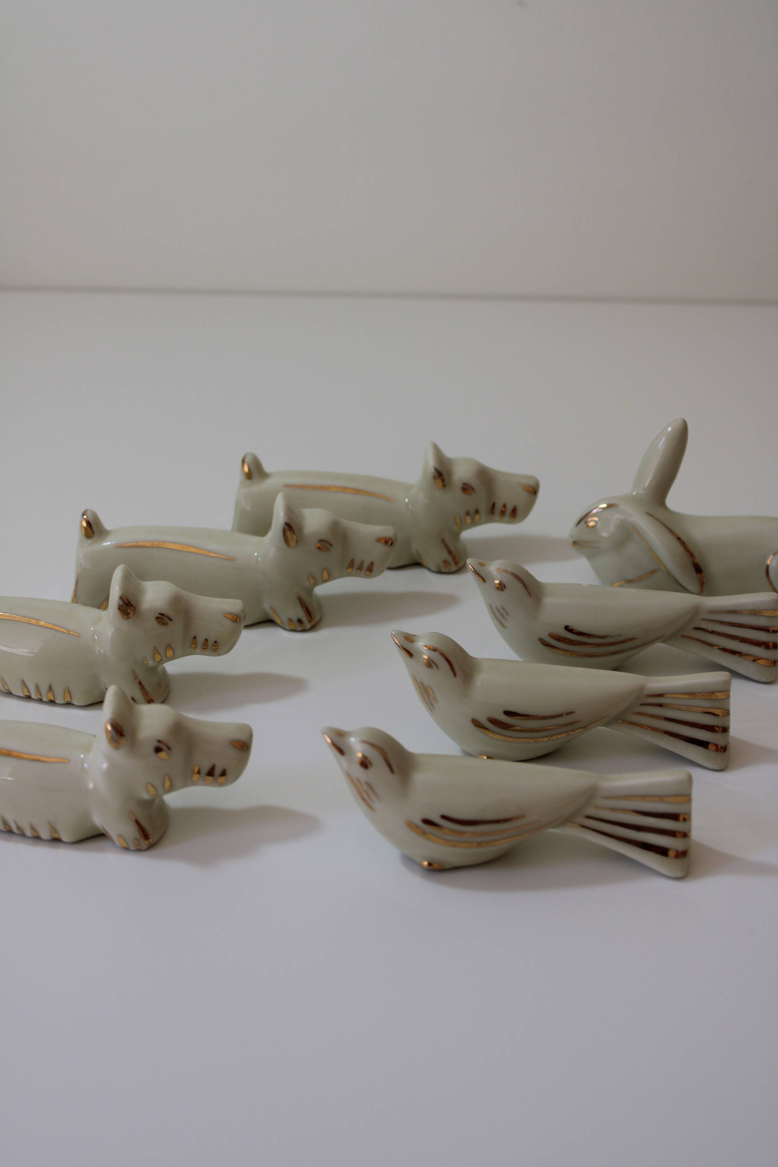 8 portes couteaux animaux porcelaine de Limoges vintage