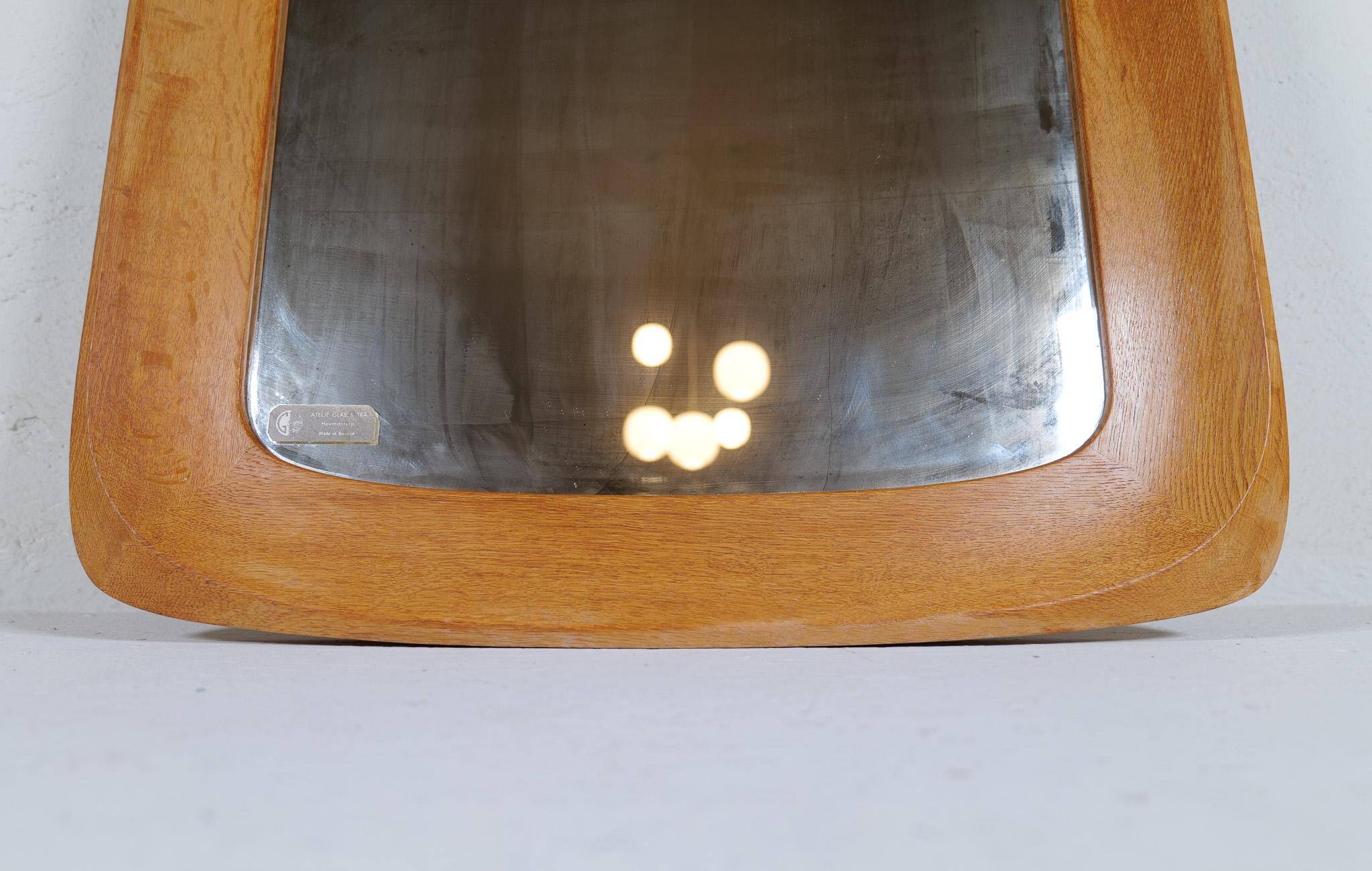 Mid-century modern sculptural wall mirror, oak, crystal glass, Glas & Trä, 1960s