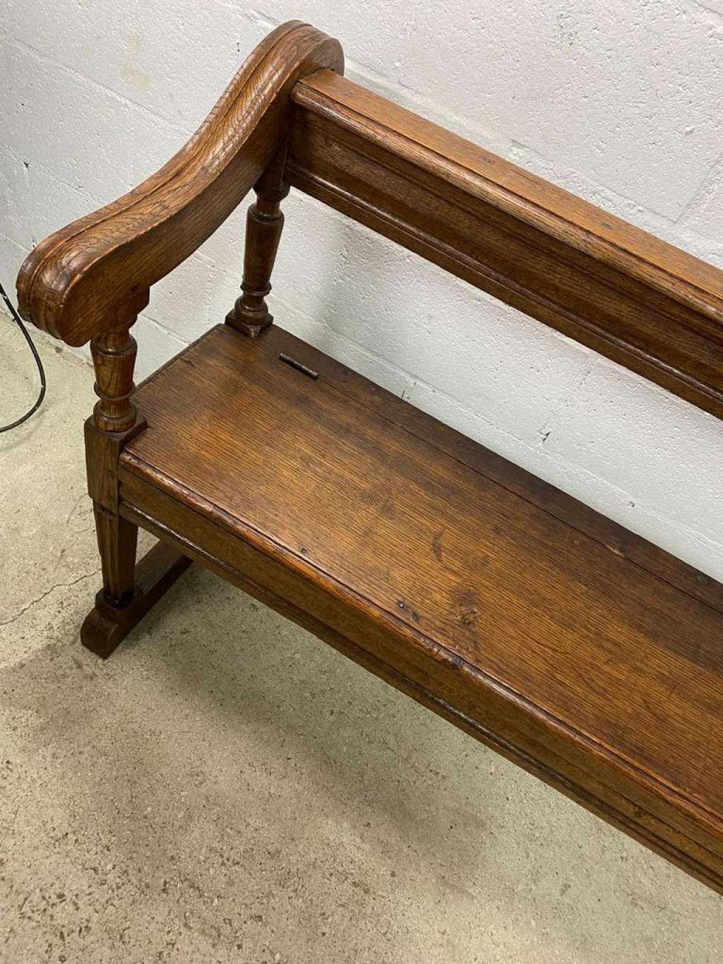 Antique wooden bench with pinned construction