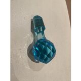 Blue carafe with vintage button