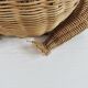 Magazine rack, design by Olivier Cajan, in wicker rattan, 1970s.