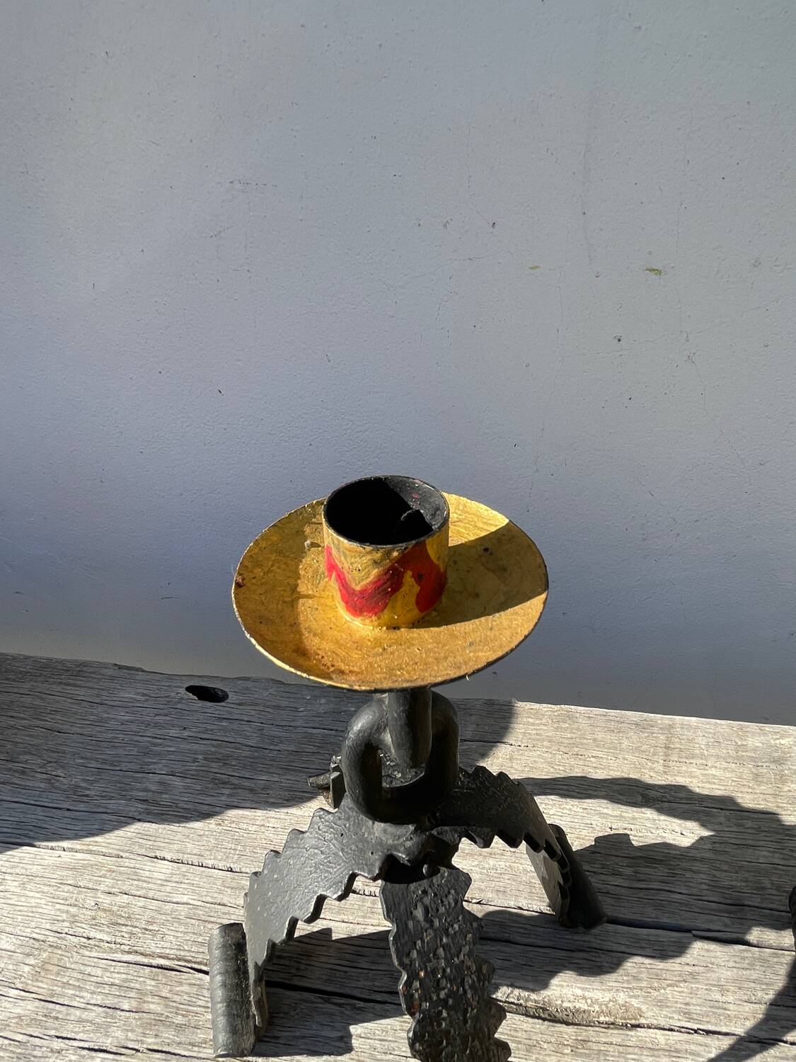 Pair of candlesticks with wrought iron chain