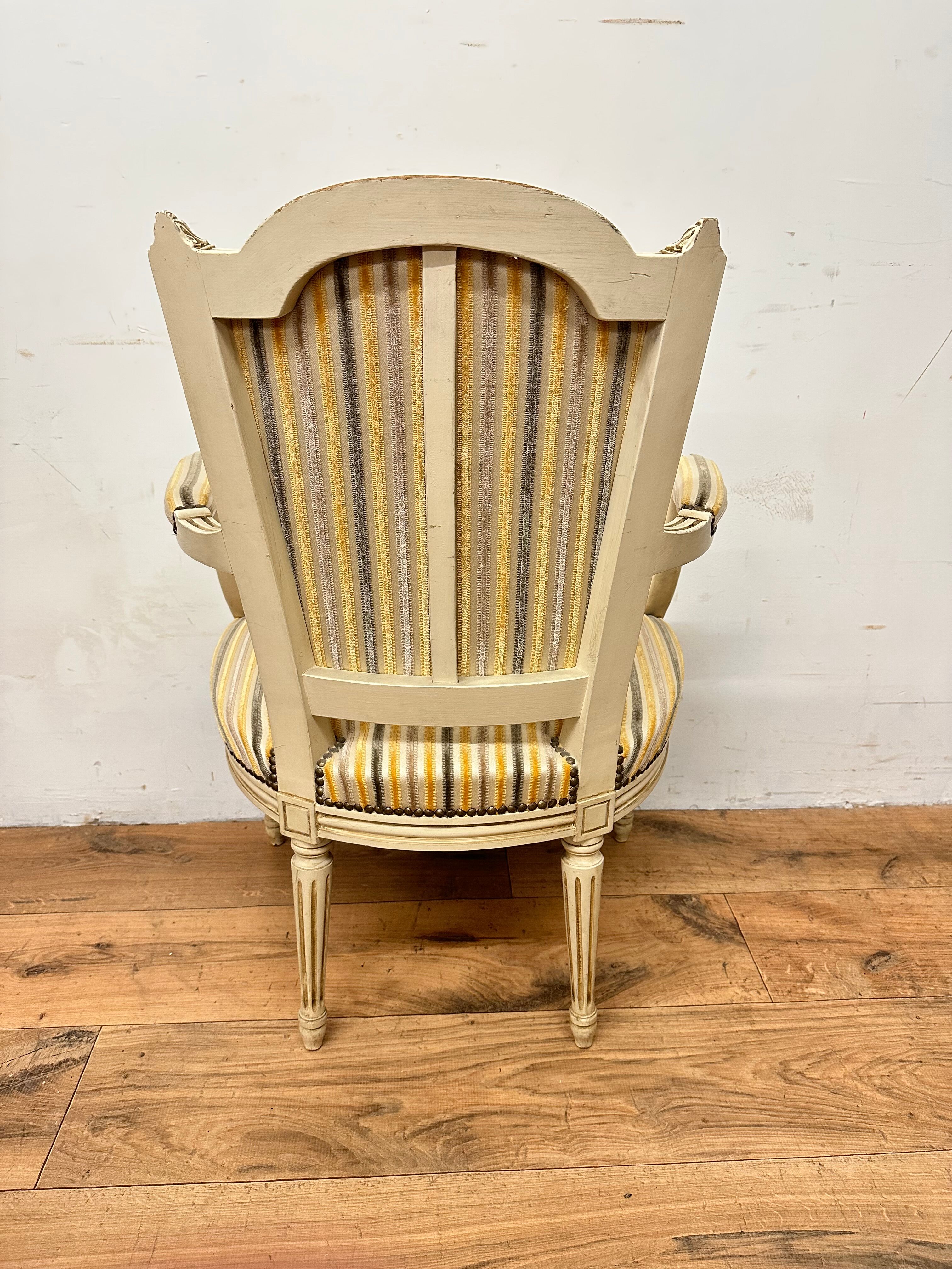 2 convertible armchairs and 2 Louis XVI style chairs