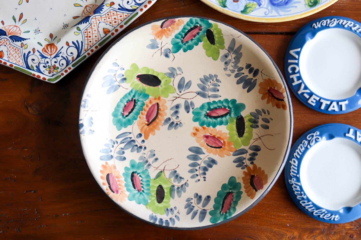 Glazed earthenware dish – polychrome floral decoration