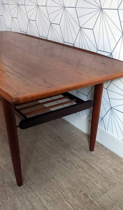 Danish 1960s teak coffee table with slatted shelf.