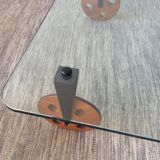 Glass coffee table on teak wheels