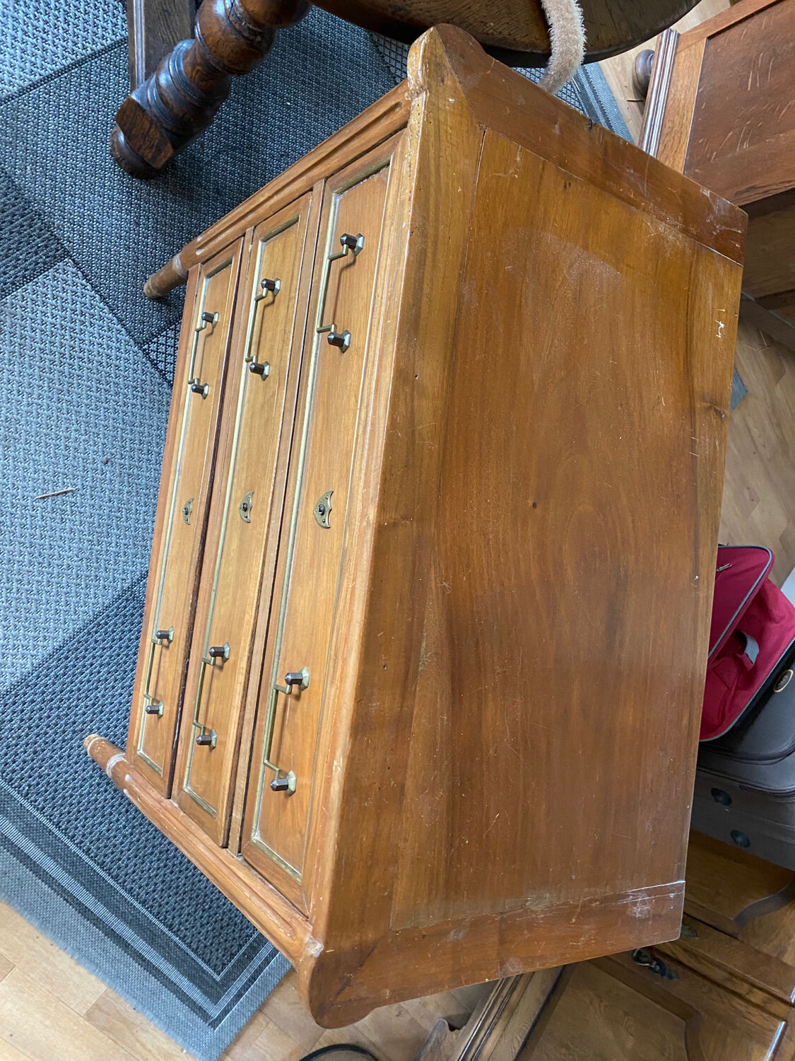 Antique wooden chest of drawers gilded brass cuffs