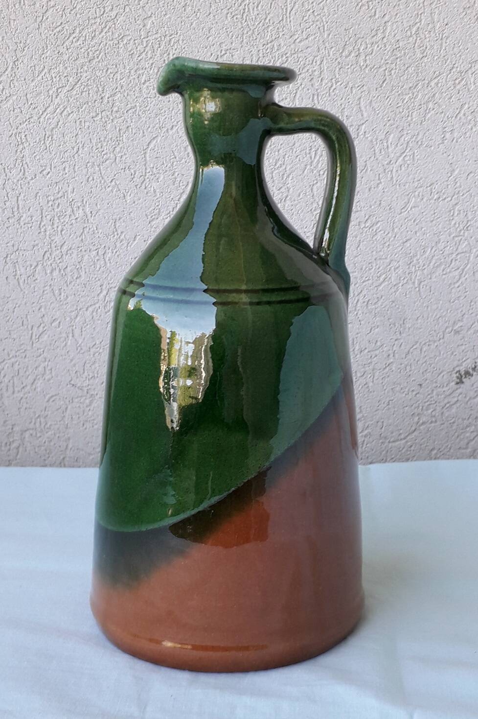 Glazed terracotta jug