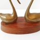 Paire de cygnes en teck & laiton 1970 vintage