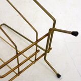 Mid-century openwork magazine rack, in gold metal & wooden handle.