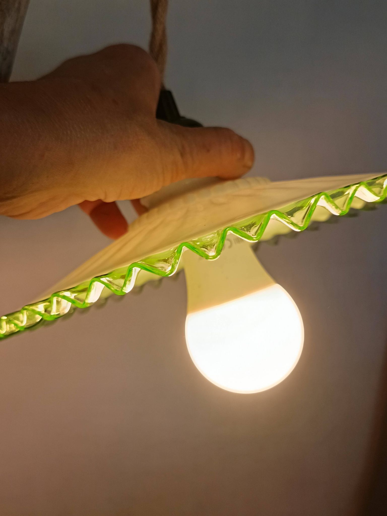Portable lamp in pale green and white glass