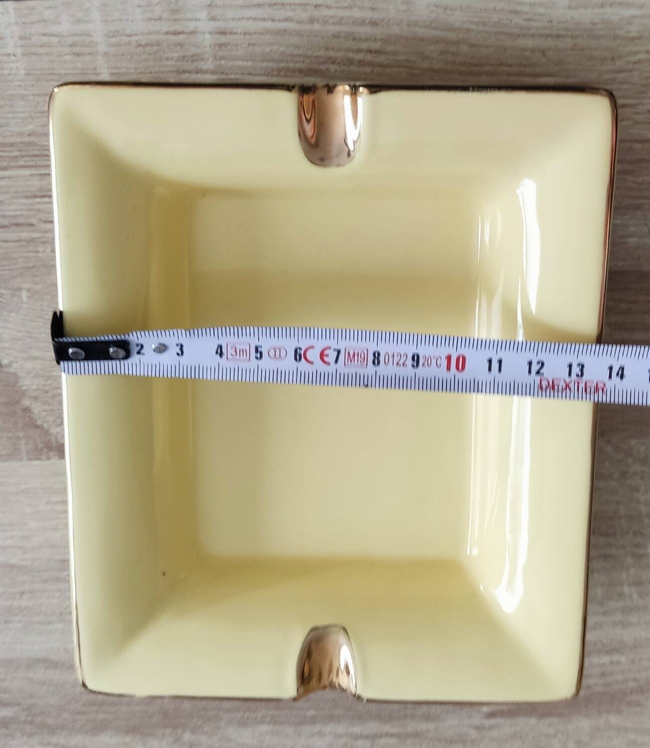 Vintage fine yellow and gold porcelain ashtray.