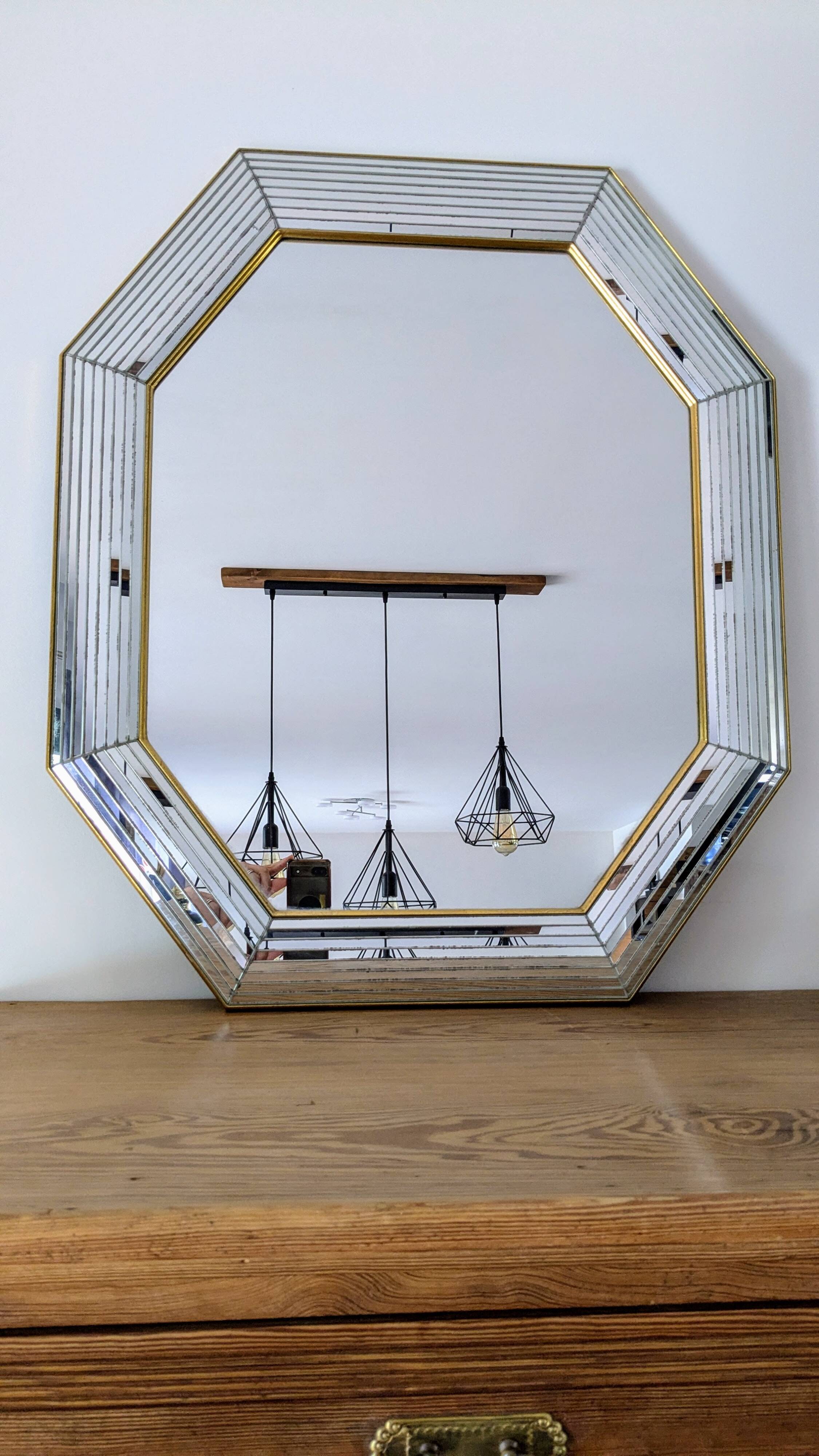 Octagonal mirror with brass parcloses by Jan Deknudt