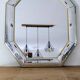 Octagonal mirror with brass parcloses by Jan Deknudt