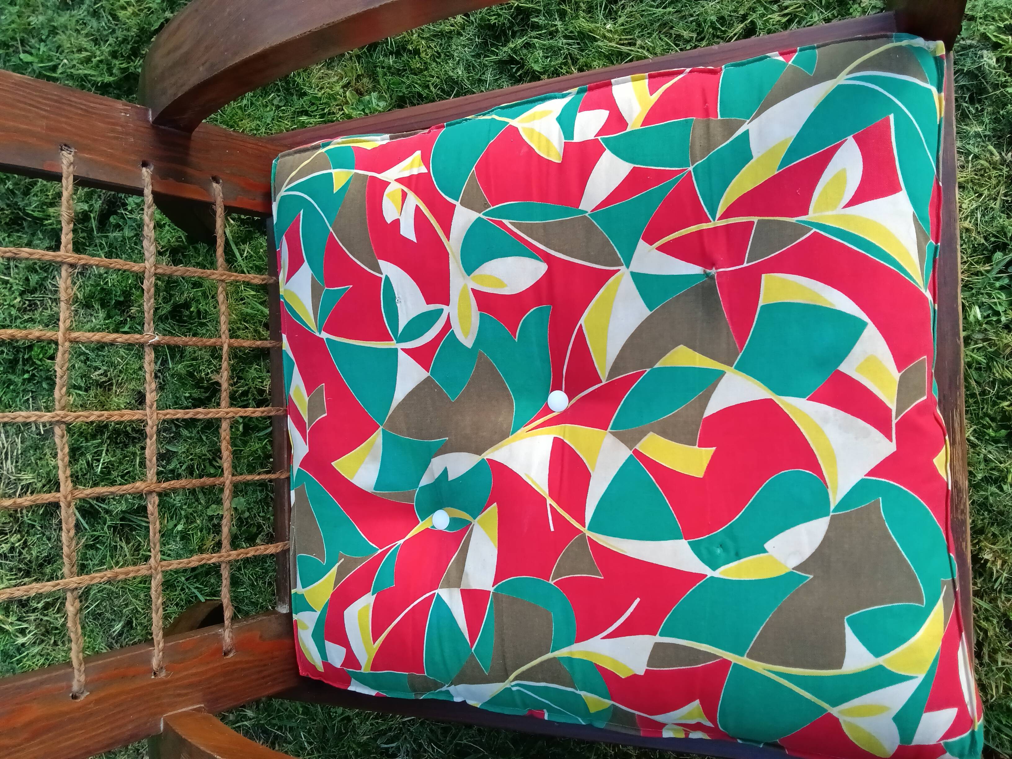 A pair of vintage rope and wood armchairs