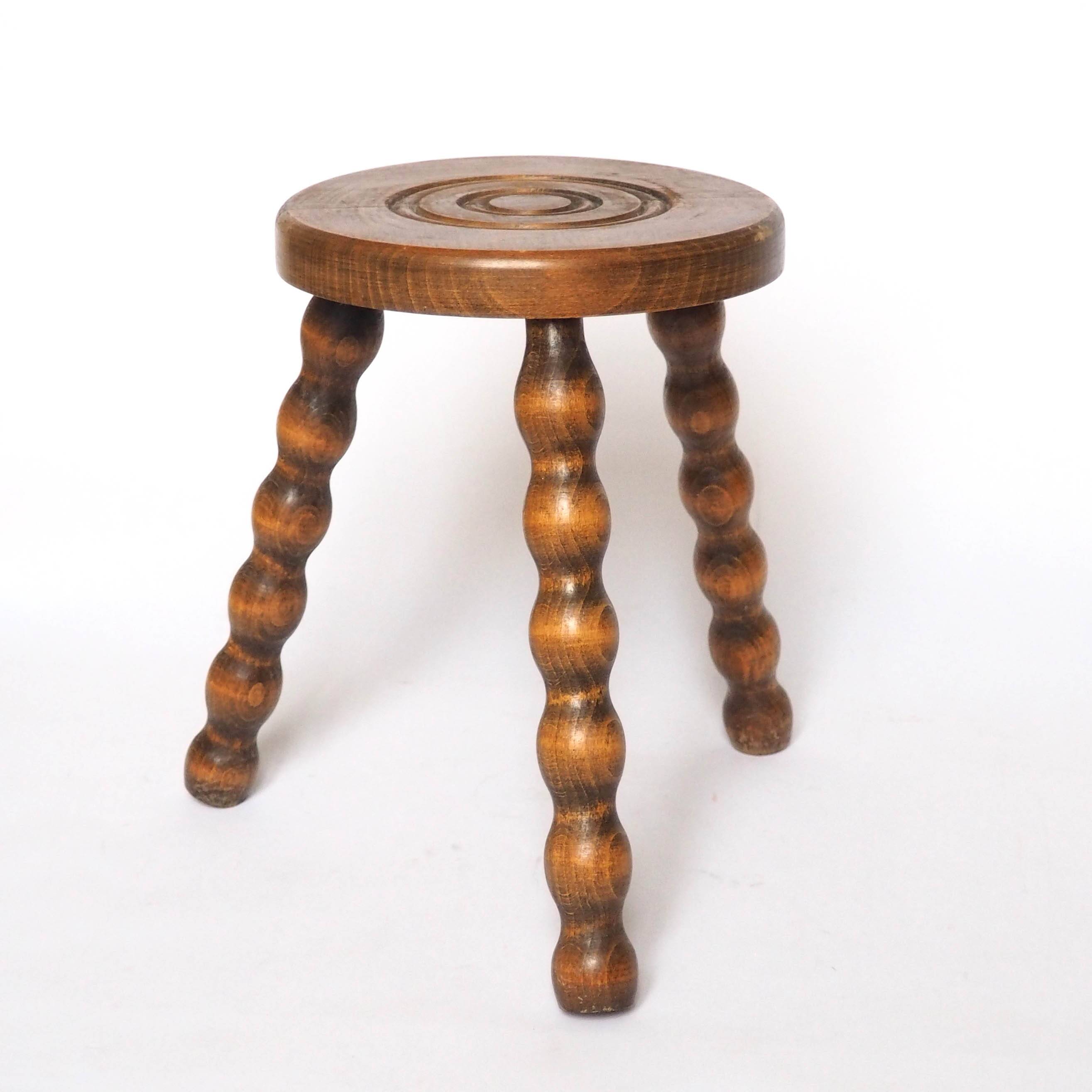 Beaded wooden tripod stool