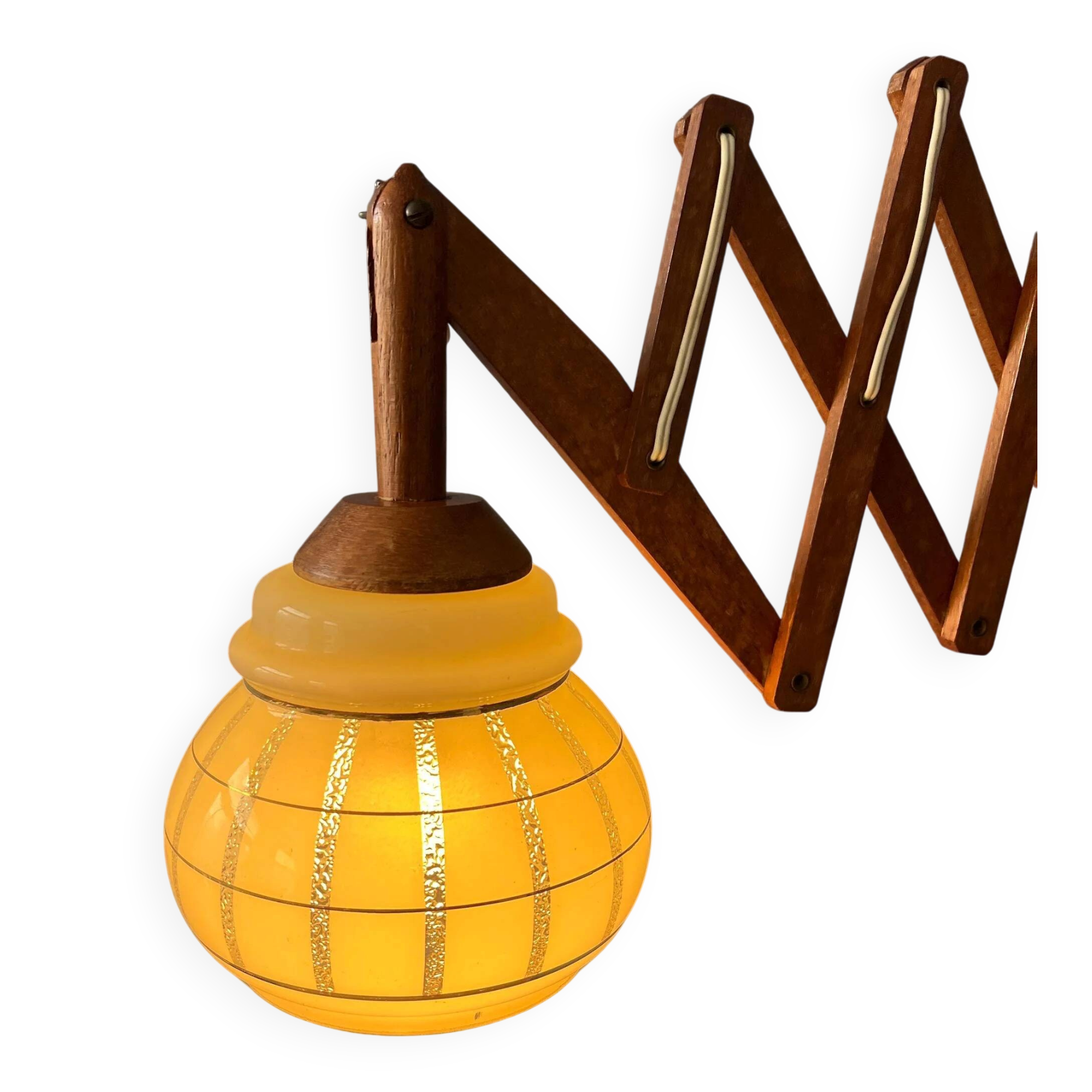 Vintage wall lamp with teak wood scissors and glass shade.