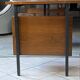 Scandinavian double-sided executive desk in rosewood and metal with 6 drawers.