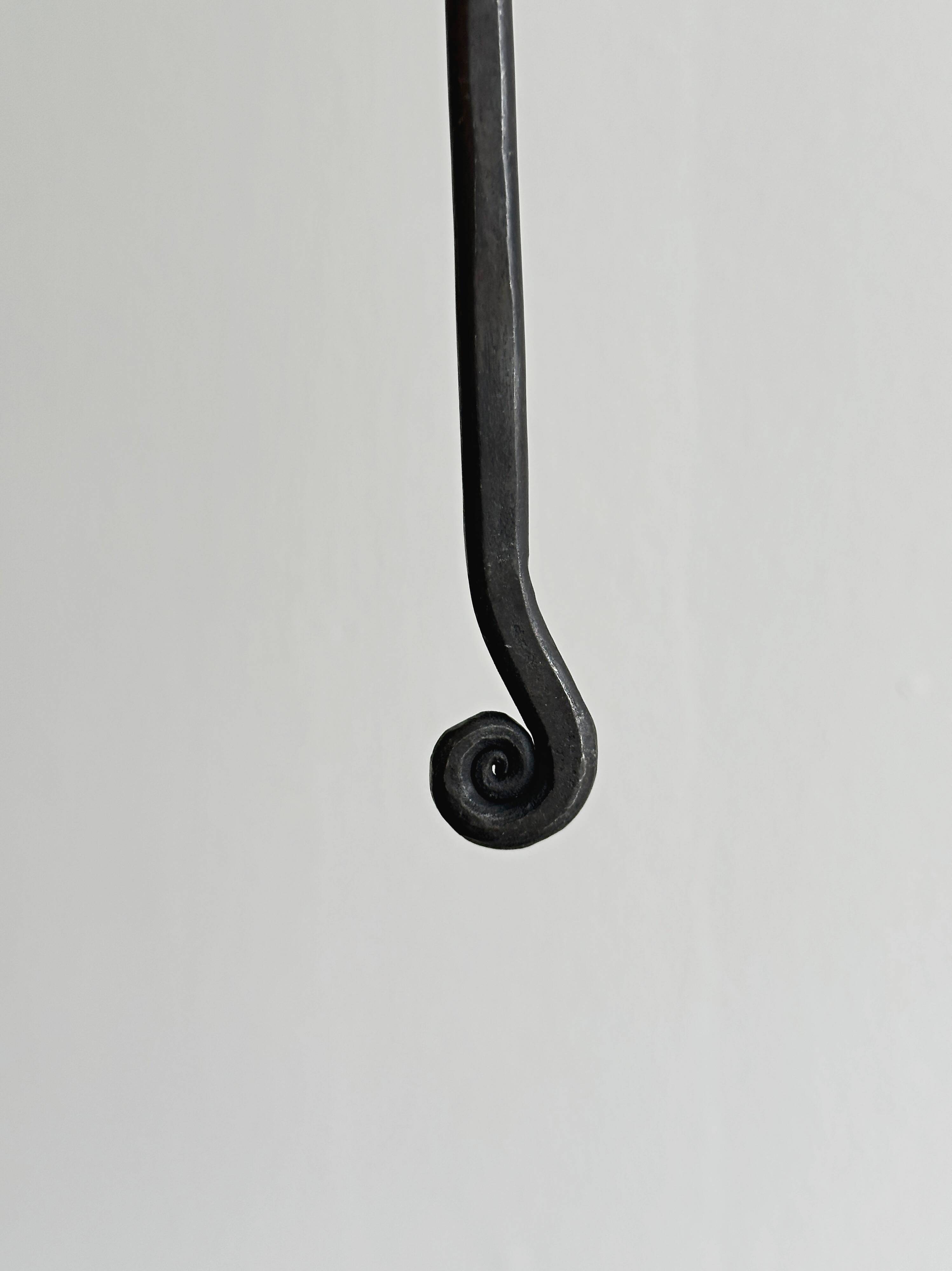 Set of 4 hammered metal cutlery with snail pattern.