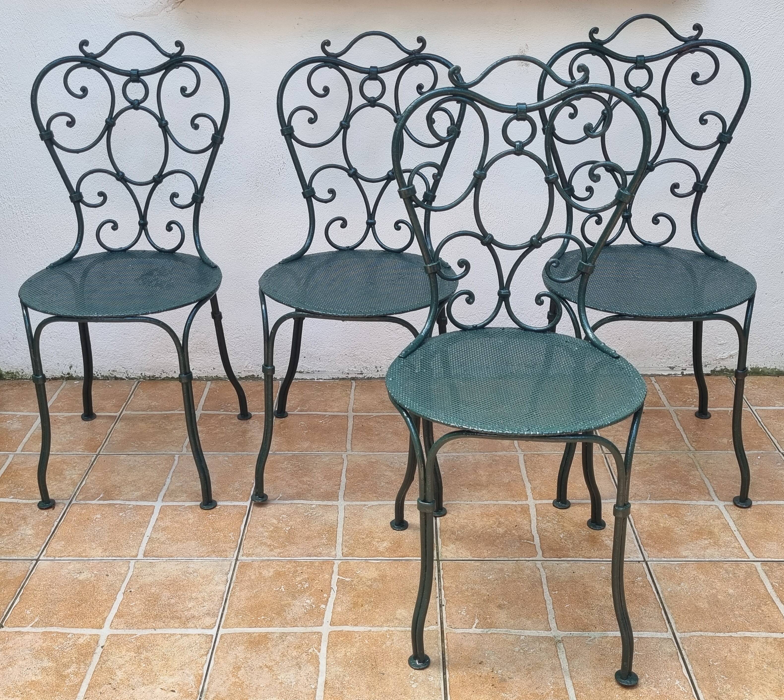 Set of 4 antique garden chairs in wrought iron from 1900.