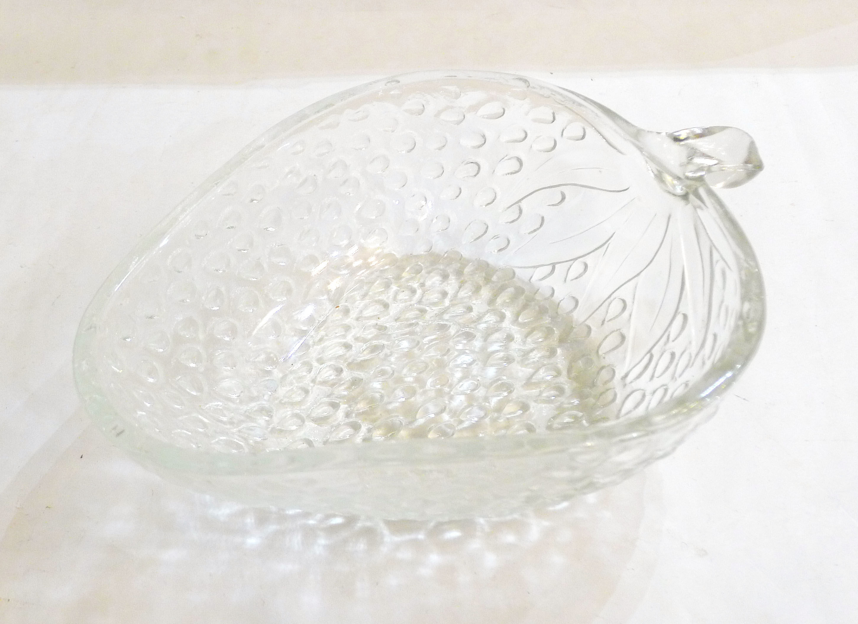 Strawberry salad in colorless glass