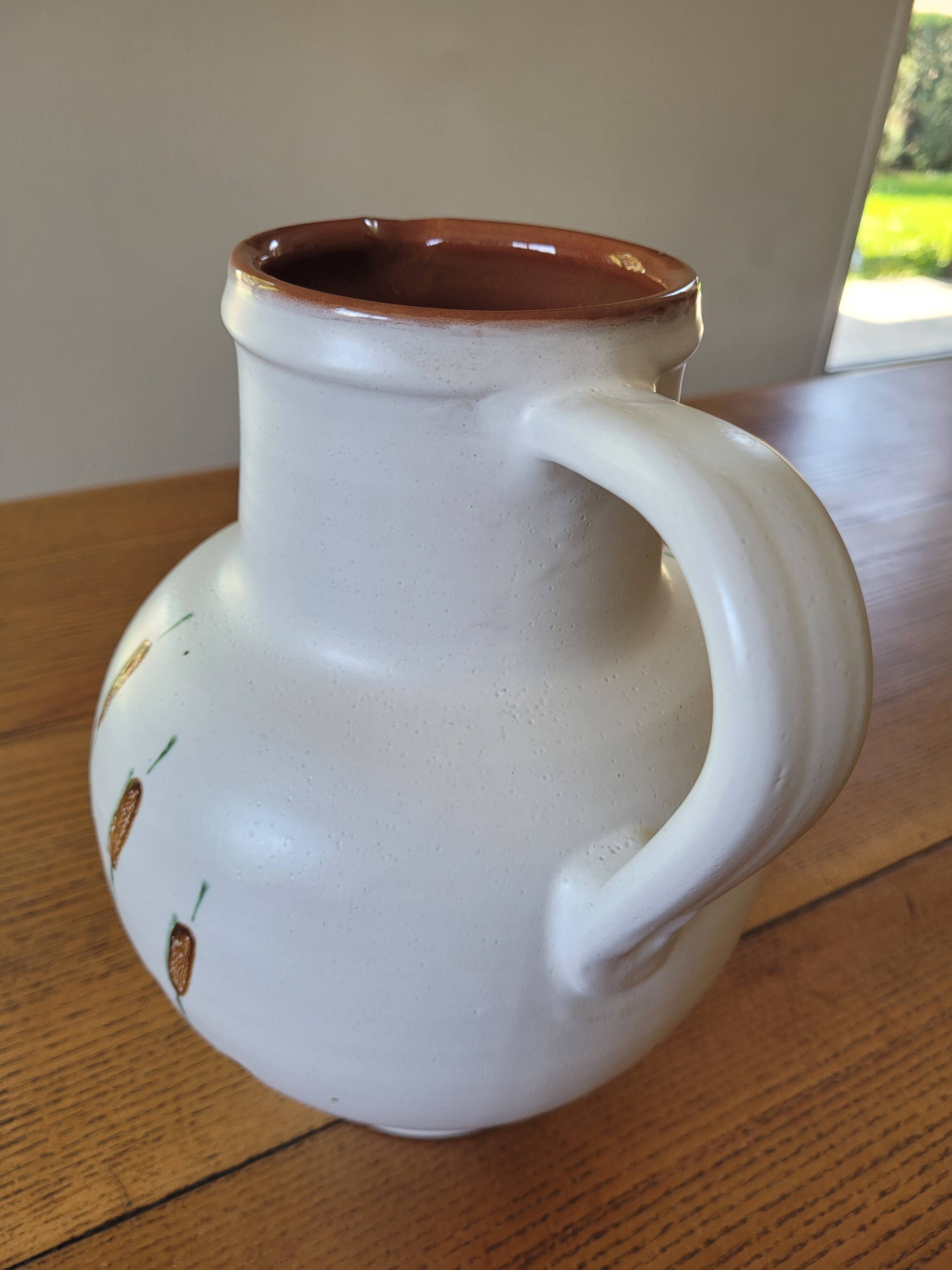 XL ceramic pitcher signed