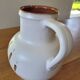 XL ceramic pitcher signed