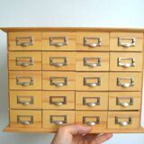 Small cabinet with compartments