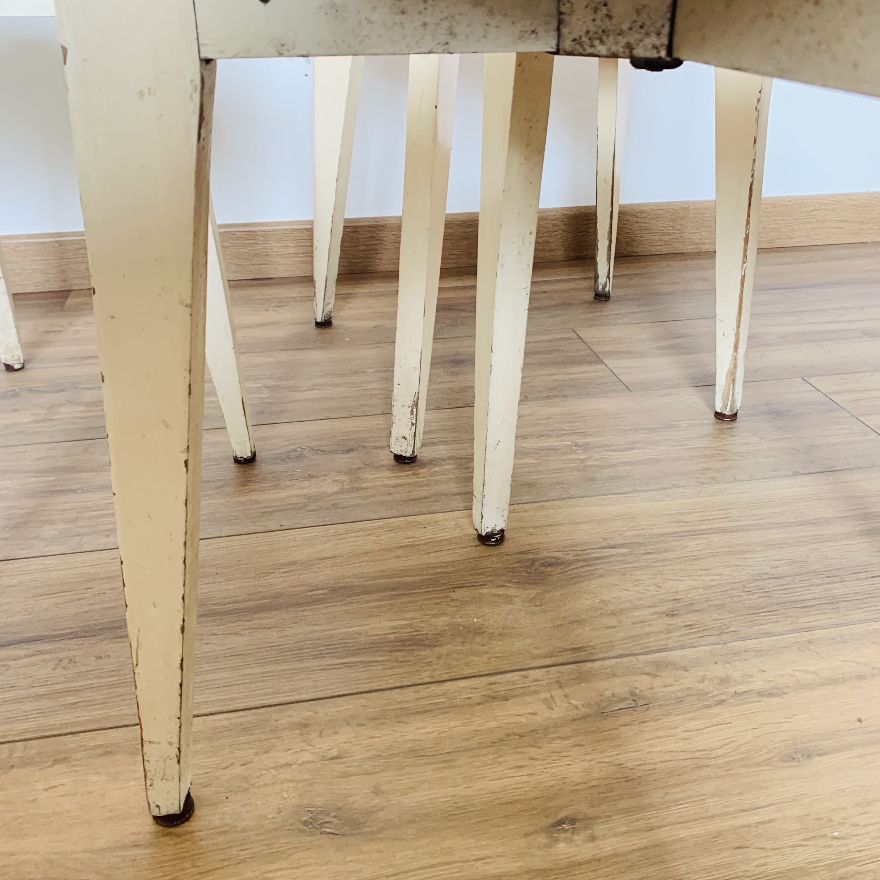 4 wooden chairs and formica kitchen