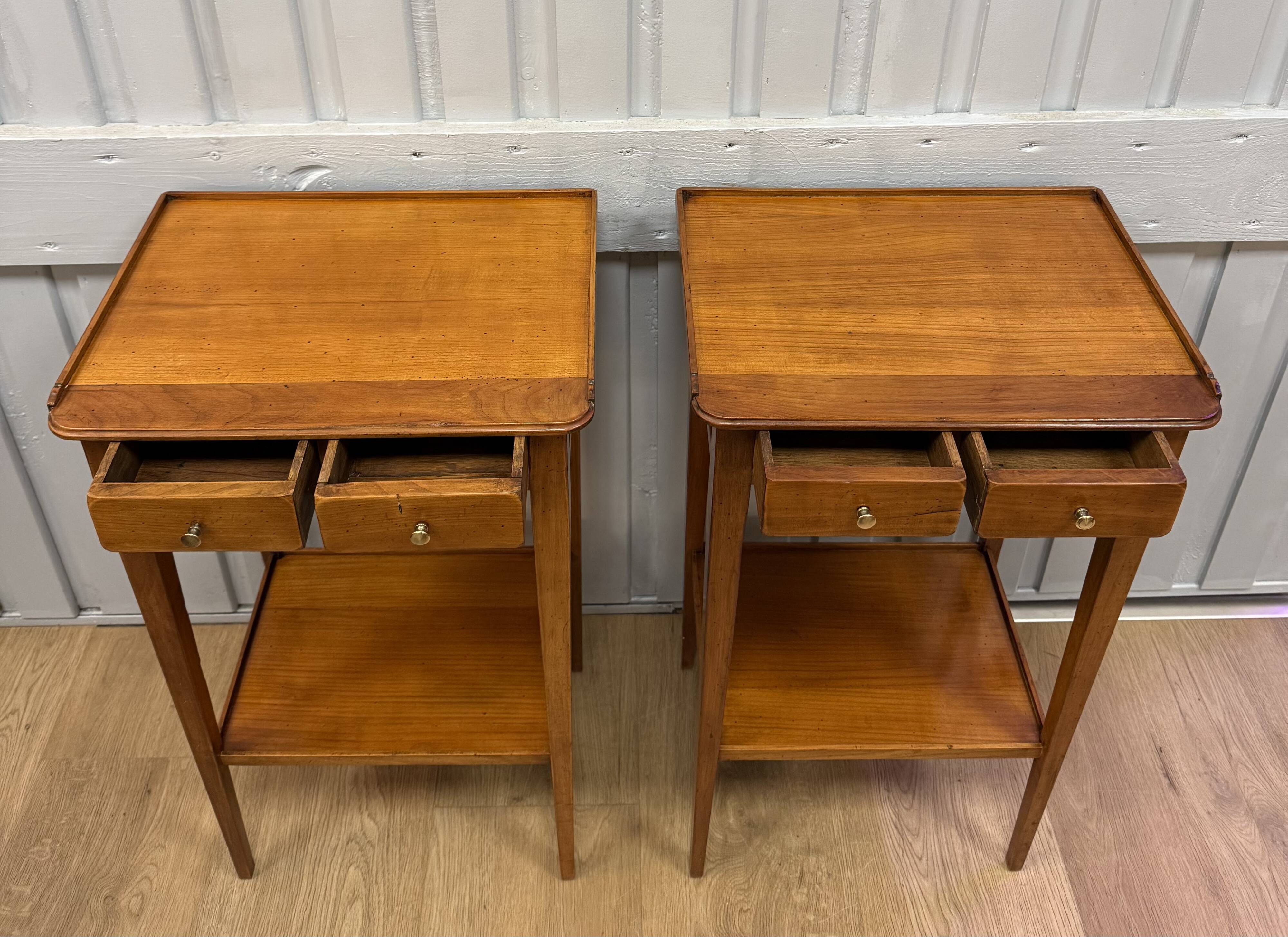Pair of small side tables in cherry wood.