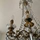 Grand chandelier in Louis XV style with crystal pendants.
