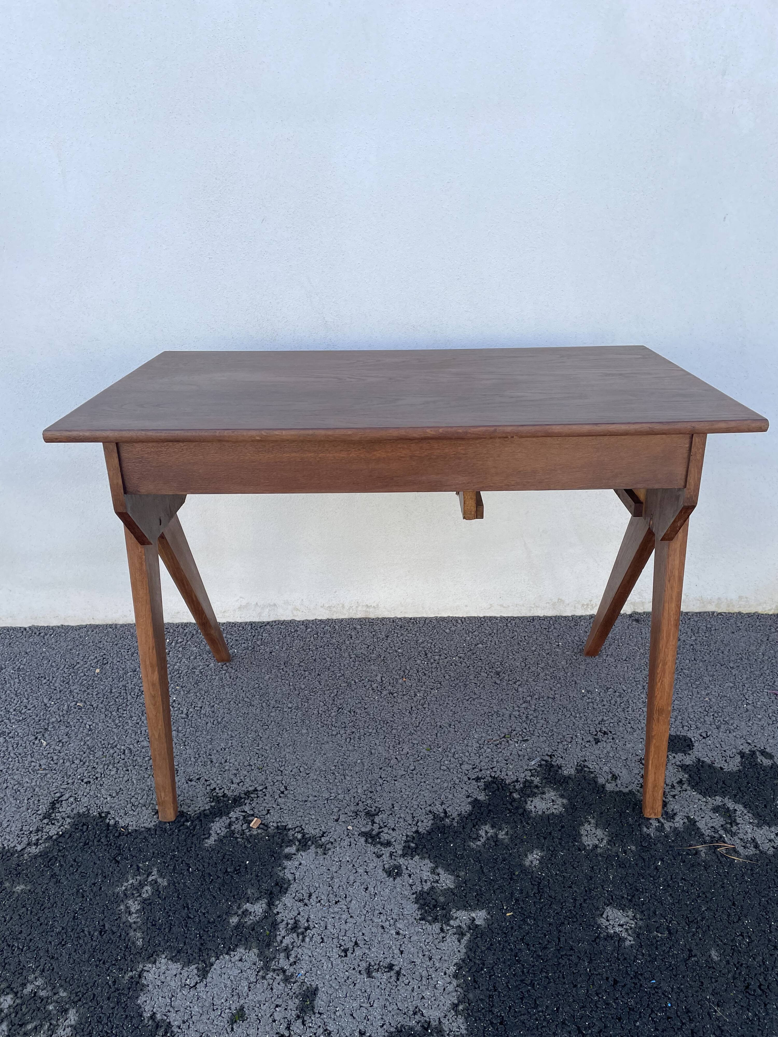 Modernist wooden desk with compass feet 1950