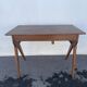 Bureau moderniste en bois à pieds compas 1950