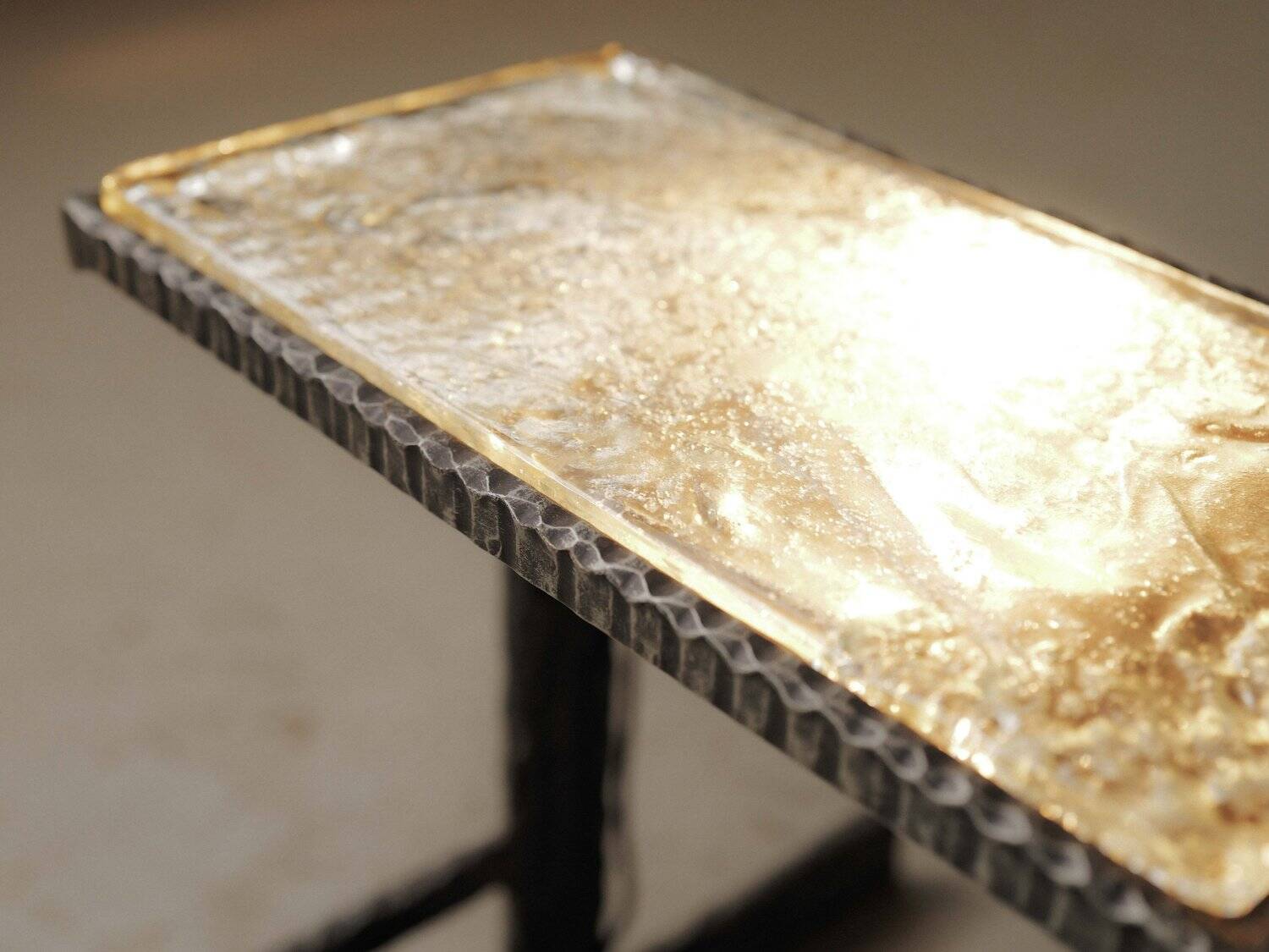 Illuminated side table in wrought iron, France, circa 1970.