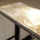 Illuminated side table in wrought iron, France, circa 1970.