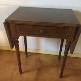 Table has two acajou tinted flaps