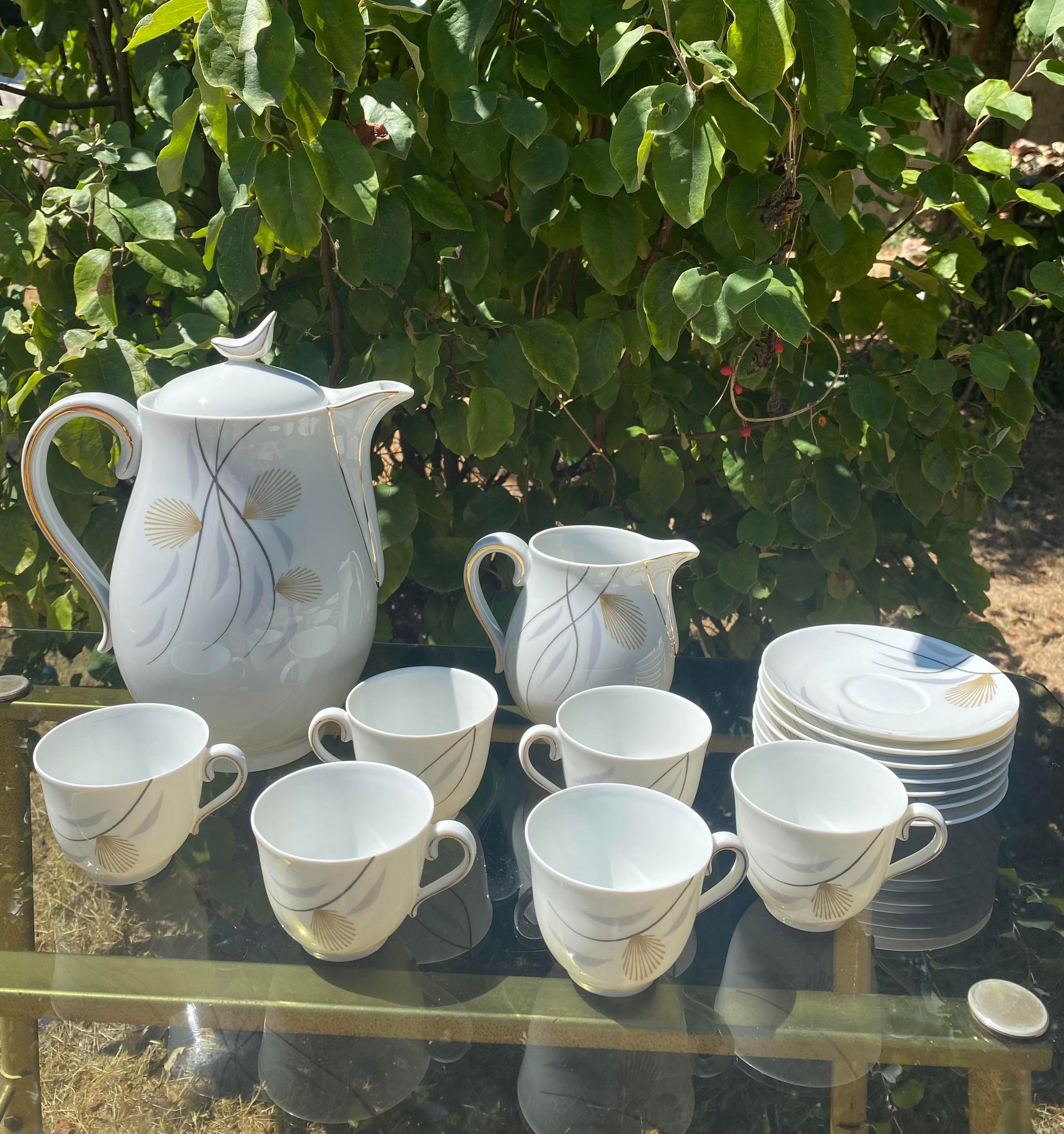 Porcelain coffee service by Charles Ahrenfeldt from Limoges France