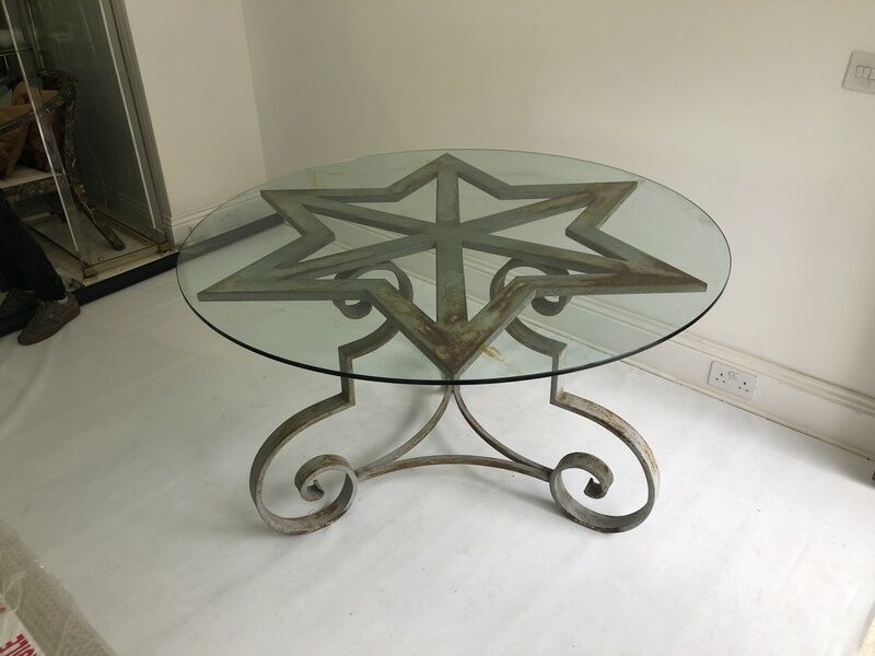Star shaped cast iron round dining table 1970