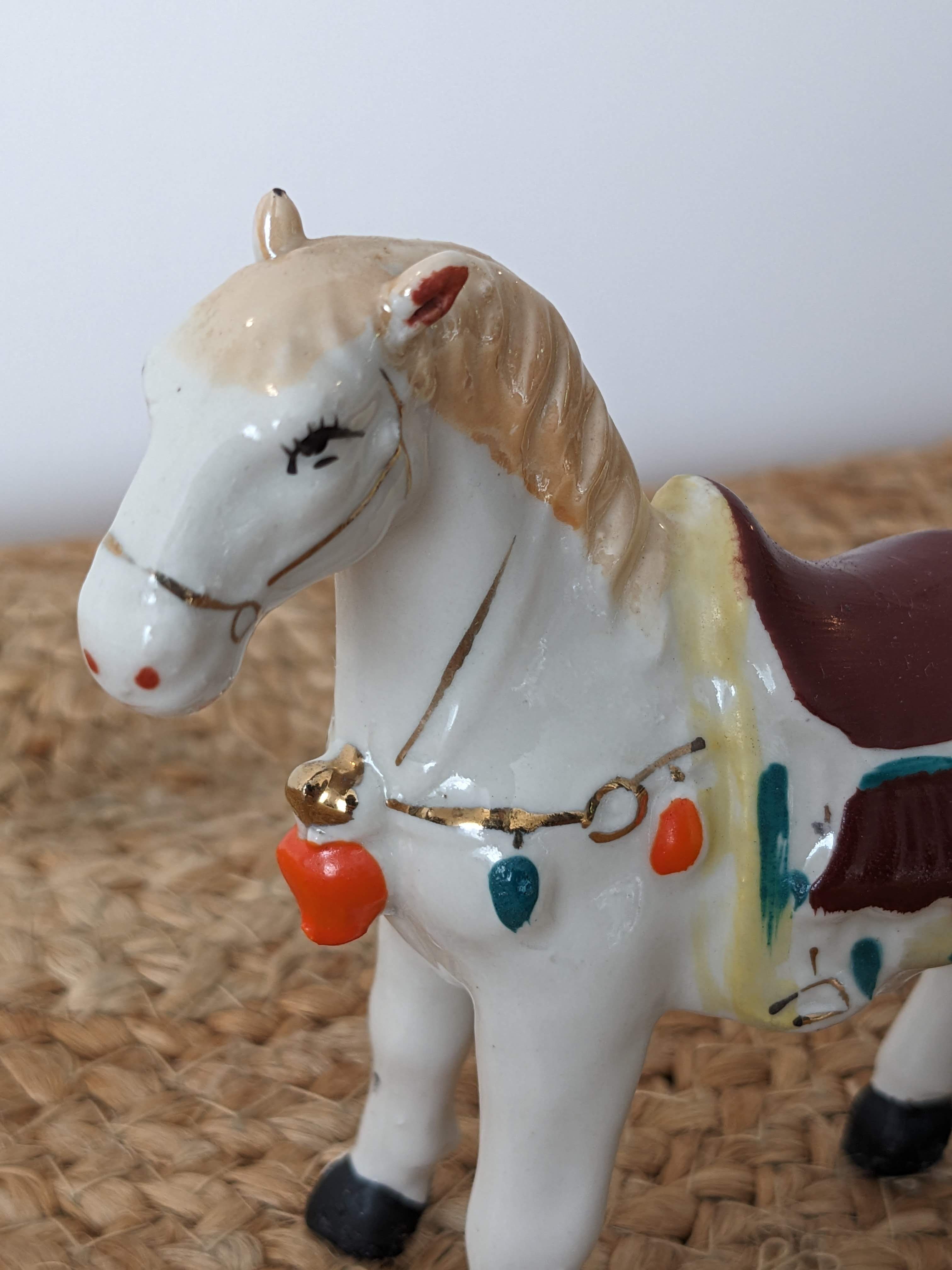 Painted porcelain horse statuette