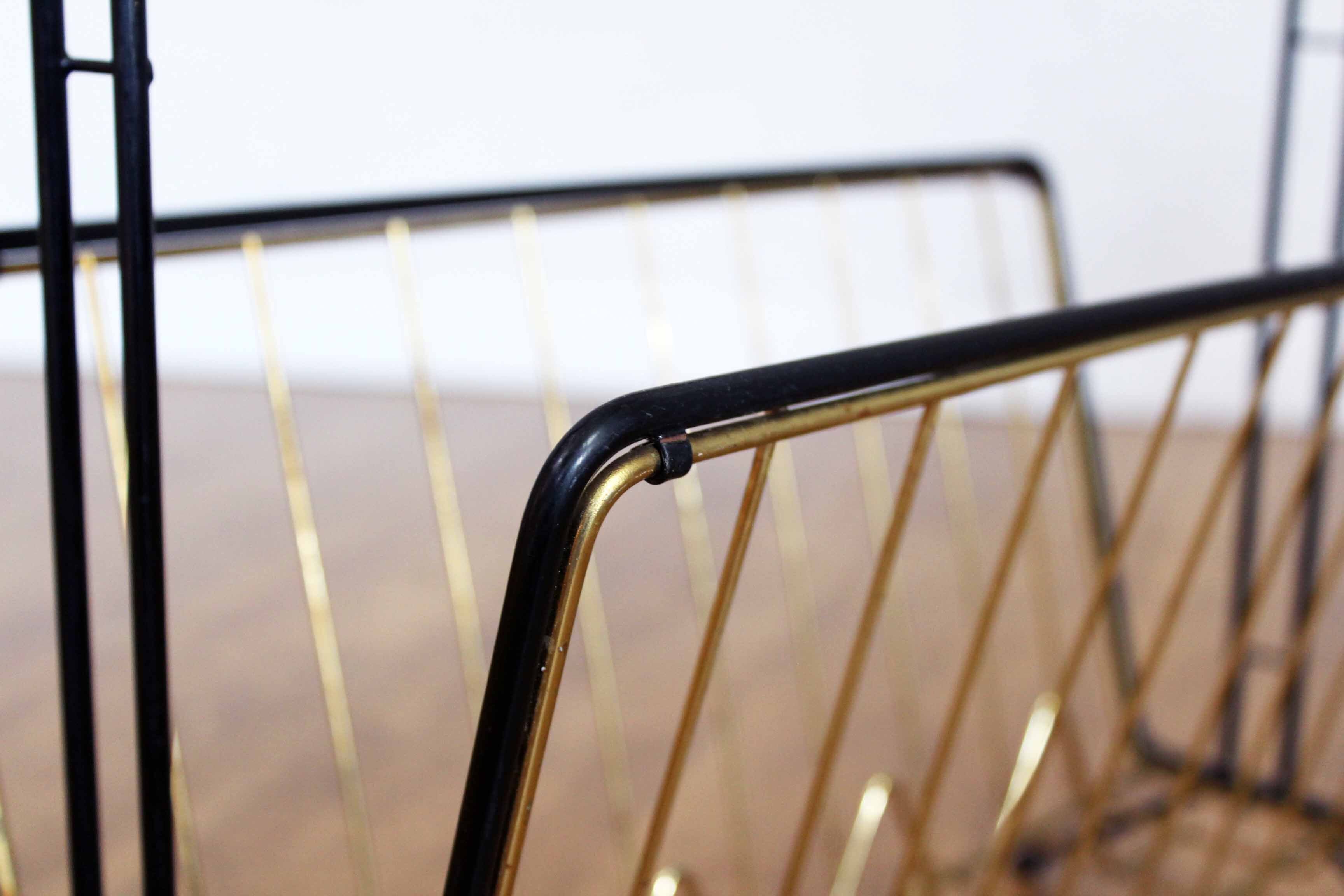 Metal magazine rack, wooden handle
