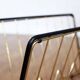 Metal magazine rack, wooden handle