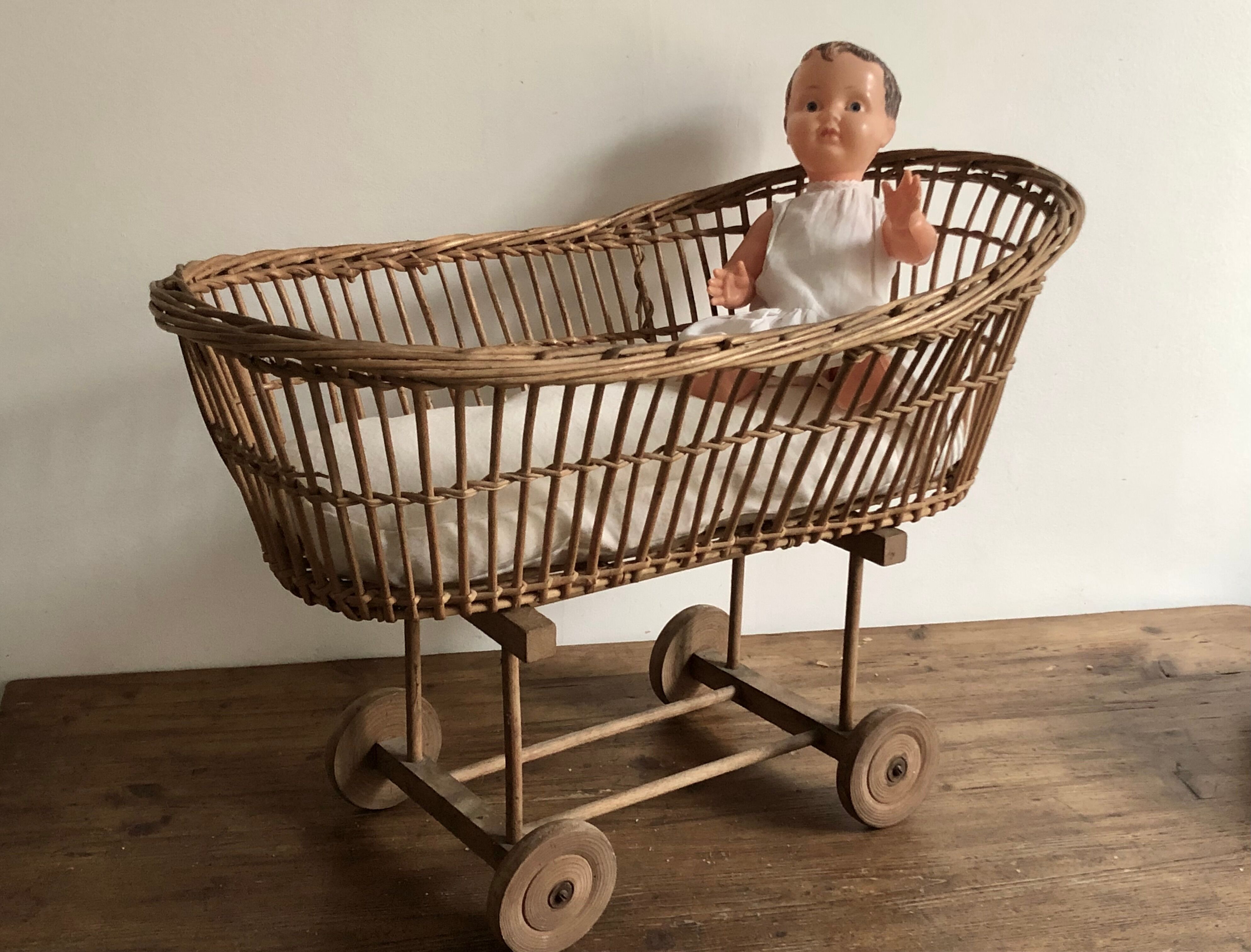 Antique toy, wicker doll cradle
