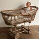 Antique toy, wicker doll cradle